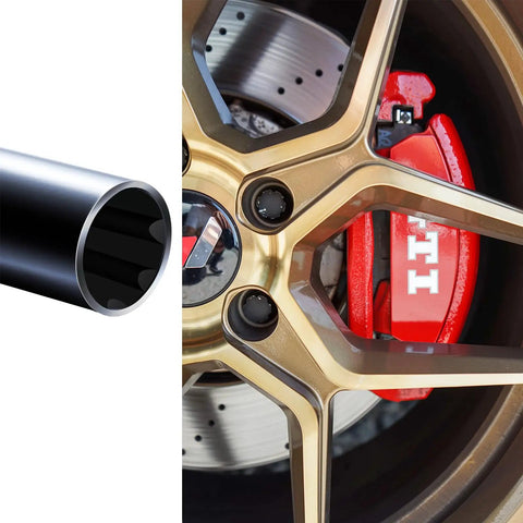 Hella Tough 7 Spline Lug Nut Key And Socket Wrench For Fuel Wheels And Rims M14 Thread next to a gold wheel with red brake calipers.