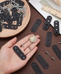 Hand holding Heavy Duty Wood Bracket Kit With 20 Flat Metal Joining Plates Black 2.16 X 0.71 Inch And 80 Screws