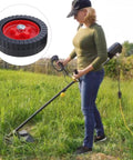 Woman using Two Pack Battery Powered Lawn Mower Attachments With Roller Wheels For Breezy Maneuvering And Simple Assembly Boosting Stability