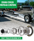 Ready To Roll Premium Trailer Hub Bearing Kit For Tandem Axles 5200 6000 Lb with components and boat trailer in background