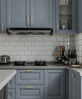 Modern kitchen with blue cabinets featuring 30 Pack Gold Cabinet Handles 5 Inch Brushed Brass T Bar Drawer Pulls, 128mm Center.