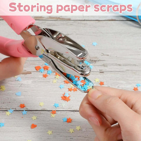 Pink Star Shaped Hole Puncher Five Millimeter With Rubber Grip Handle cutting star shapes for crafting and scrapbooking projects