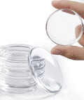 Clear Self Adhesive Door Stoppers For Wall Heavy Duty Gel Bumpers, showing a hand holding a gel bumper above a stack of similar pads.