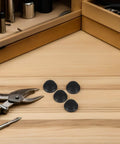 Premium Umbrella Diameter Thread Repair Kit For 6mm Frames Includes 8 Black Plastic Convex End Caps With Smooth Edges And Polished Finish Perfect For Patio Home Garden Upgrades. black 6mm umbrella end caps with pliers on wooden surface