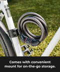 Bike Cable Lock 6 Feet By Half Inch With Resettable Four Digit Combination And Black Vinyl Coating attached to bike frame