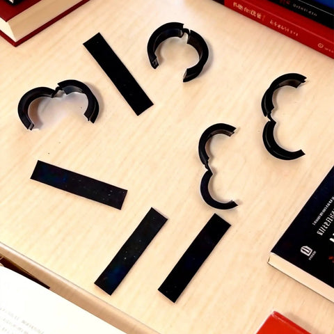 20 Piece Bike Handlebar Spacer Kit With Anti Vibration Rubber Pads And Non Slip Grip Pads, shown on a table.