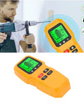 Stud Finder Wall Scanner Wood Metal Beam AC Wire Detector with clear LCD display being used on a wall