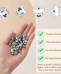 70 Pack Locking Pin Backs Metal Seals For Badges Brooches And Enamel Pins Secure Your Swag With These Dope Pin Fasteners, displayed in hand.