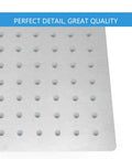 Close-up of ultra thin 12 inch square rain shower head with high flow stainless steel, brushed nickel, nozzle detail.