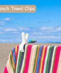 Heavy duty plastic clothes pins featuring anti rust springs and non slip silicone pads on beach towels.