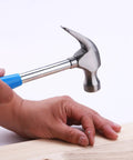 Using claw hammer from 40 Piece All Purpose Tool Kit For Home Garage Office And Dorm Use Durable DIY Ready Handyman Set for nailing
