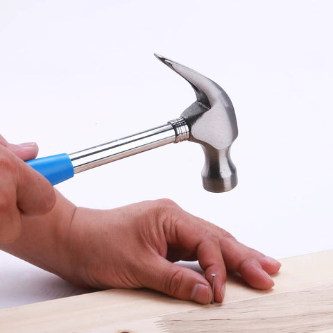 Using claw hammer from 40 Piece All Purpose Tool Kit For Home Garage Office And Dorm Use Durable DIY Ready Handyman Set for nailing