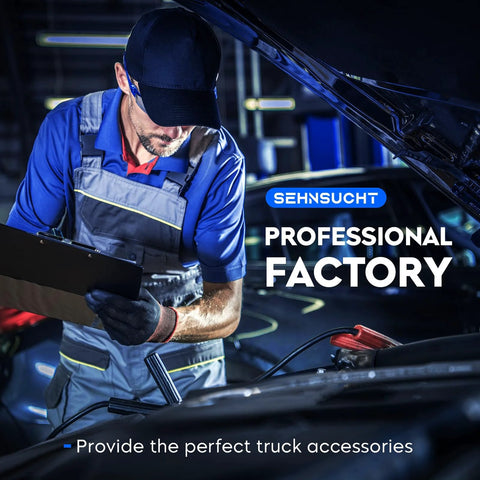 Mechanic inspecting vehicle engine in a professional factory environment.