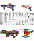 Badass Double Pegboard Hooks 15 Piece Set Crafted From Hella Tough Steel With Cushioned Rubber Tips in action holding toy guns.