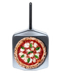 Ooni 16-inch metal pizza peel with long black handle, blade holds a tomato sauce mozzarella basil pizza
