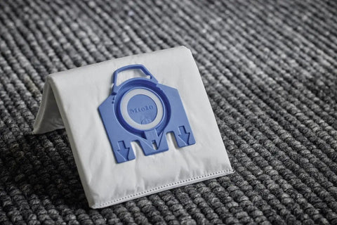 AirClean 3D Efficiency Dust Bags Type GN Allergy XL Pack showing self sealing auto collar on textured surface