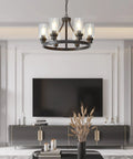 Farmhouse Round 6-Light Chandelier In Oil Rubbed Bronze With Glass Shade hanging in modern living room setting