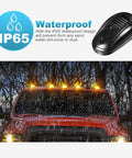 Amber 24 LED Smoke Cab Roof Marker Lights Kit With Wire Harness installed on truck under rain showcasing waterproof feature