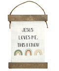 Jesus Loves Me This I Know Hanging Canvas For Kids Boho Rainbow Nursery Decor Inspirational Christian Wall Art with rainbow design