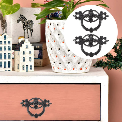 Antique Ring Handle Drop Pulls 2.56 Inch Cabinet Hardware on a pink dresser, decorative zinc alloy vintage style for wardrobes and drawers.
