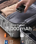 No Fuss Ultra Compact 15000 Mah Portable Charger With Built In Cables held above packed suitcase, showcasing convenience for travel.
