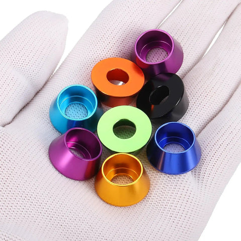 M8 Cone Cup Washers Anodized Aluminum Titanium Gray Flange Gaskets Heavy Duty Fasteners For Rc Drones Cars And Modded Builds Top Shelf 20 Pack Custom Hardware Set in various colors on a gloved hand.