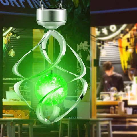 Solar Powered LED Wind Chime Outdoor Lights For Yard Decor Color Changing Hanging Light glowing in green