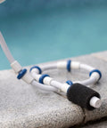 Complete Pool Cleaner Sweep Hose Kit B5 Replacement for Polaris Zodiac showing detail of hose and tail scrubber next to pool edge