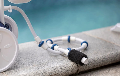 Complete Pool Cleaner Sweep Hose Kit B5 Replacement for Polaris Zodiac showing detail of hose and tail scrubber next to pool edge