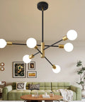 Living room with Sputnik Chandelier Pendant Light Black And Gold, Mid Century Modern Industrial E26 Ceiling Fixture over green sofa.