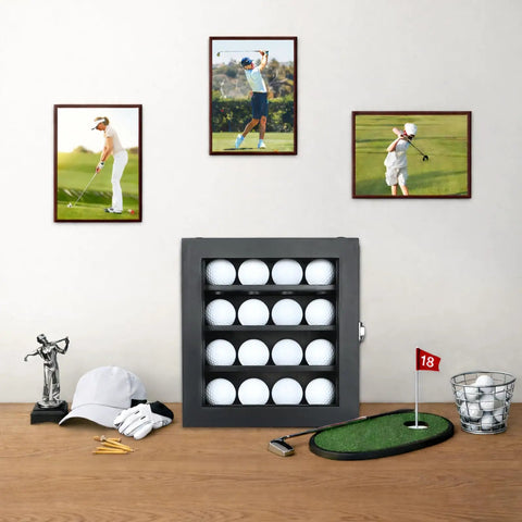 Golf Ball Display Case With 16 Slots For Wall Mount Display Clear Glass Door And Lock shown on a desk with golf accessories.