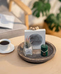 Solid Wood Lazy Susan Set Big Round Serving Tray With Hella Smooth Ball Bearing Turntable Base For Kitchen Counter And Dinner Party Centerpiece Slick Spinning Organizer Easy Setup Stand with green candle and decor.