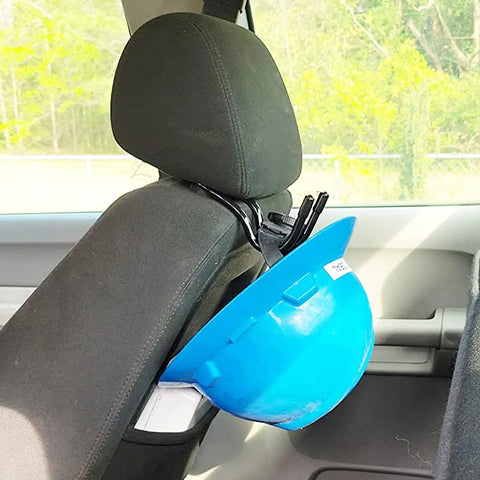Universal Over The Seat Hard Hat Rack And Headrest Hook for back seat storage holding a blue hard hat on a black car seat