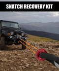 Beefy Snatch Block Ring Winch Pulley Recovery Kit With One Half Inch Soft Shackle Three Inch By One Hundred Eighteen Inch Tree Saver Strap For Off Road UTV ATV And Trucks 41000 Lb Ring Strength Red Ring And Red Shackle 45000 Lb Strap, red ring and strap on Jeep recovery scene