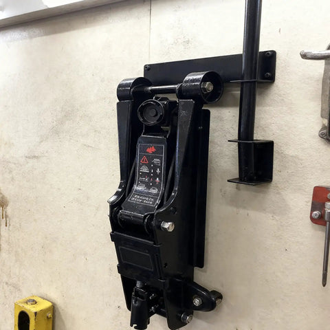 Floor Jack Stand Wall Mount For Hydraulic Trolley Jacks Heavy Duty Wall Storage Brackets Organizer mounted on wall with jack