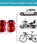 Red Tire Valve Stem Caps 4 Pack Dope Die Cast Aluminum With O Ring Seal Rust Resistant Chrome Electroplated Finish beside vehicles