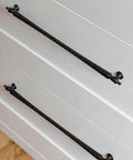 Matte Black Cabinet Pulls 12 5 8 Inch Hole Centers 6 Pack Zinc Alloy Modern Drawer Handles installed on white drawers