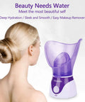 Woman using At Home Spa Facial Steamer for Deep Hydration and Open Pores, Personal Steam Inhaler Sauna with Warm Mist, purple