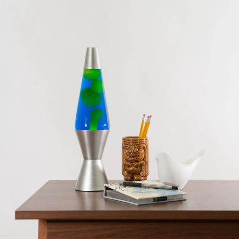 Classic 14.5 Inch Silver Base Lava Lamp With Yellow Wax In Blue Liquid For Instant Mood Lighting on a wooden table in living room.