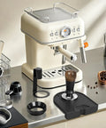 Bad Ass Home Barista Essential Kit includes espresso machine, 58mm tamper, WDT tool, and silicone mat on kitchen counter.