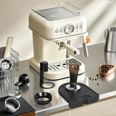 Bad Ass Home Barista Essential Kit includes espresso machine, 58mm tamper, WDT tool, and silicone mat on kitchen counter.