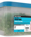 Rock Solid Electro Galvanized Roofing Nails Number 12 Gauge One Inch Long Spiral Shank With Flexible Plastic Cap Heads For House Wrap Sheathing And Underlayment Install in a clear bucket.