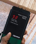 Close-up of In Kiln Wood Moisture Meter With Dual Calibration For Soft And Hard Wood, showing 9.8% reading on display.