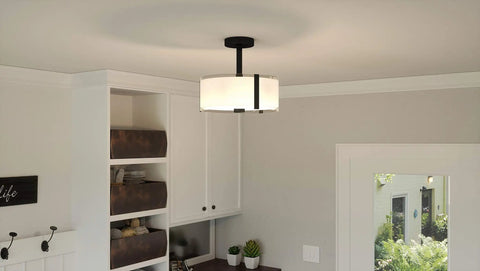 Porter Semi Flush Mount Matte Black in modern room, durable steel, low profile, unobtrusive lighting brightens space with clean glow