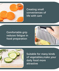 Crinkle Cutter Fnife with stainless steel blade and rubber grip for slicing vegetables; shown with carrots and cucumbers.