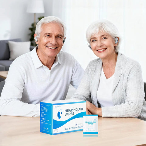 Front view of Hearing Aid Wipes box and a single sachet with alcohol-free towelettes on a table, blue packaging.