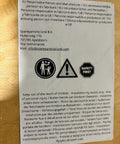 Safety instructions label with multilingual warnings and safety icons on a wooden background for Power Steering Kit For John Deere Tractors JD 2020 2030 2040 2130 Includes Pump Reservoir Hoses Tie Rods Cylinder Drag Link Filter Bracket And Easy Install Guide DIY Friendly.