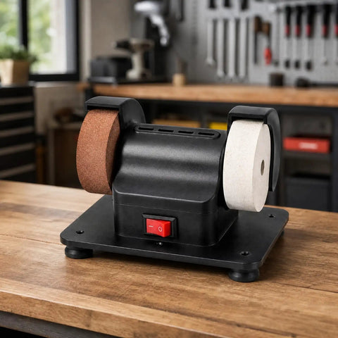 Badass Dual Wheel Bench Grinder With Sturdy Rubber Footed Base on wooden table, compact black design with two wheels for sharpening.