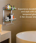 2 Tier Glass Wall Shelf With Integrated Towel Bar In Brushed Silver Finish, mounted in bathroom near bathtub holding bottles