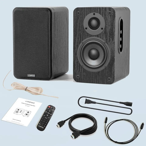 Powered Bookshelf Speakers With Wireless 100W RMS Bluetooth And EARC shown with remote, cables, and manual